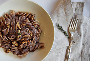 Eliche Pasta with creamy Red chicory sauce and roasted walnuts